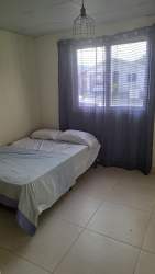 Contemporary bathroom with blue accents, full shower, tile floors Playa Dorada Arraiján