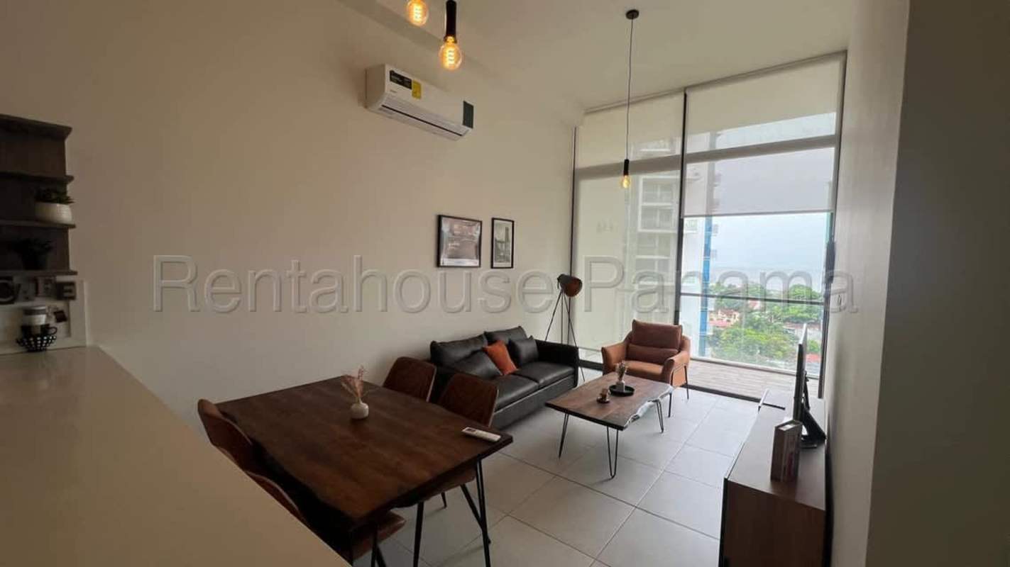 Bedroom with large window and partial ocean view PH Coco del Mar Panama furnished apartment