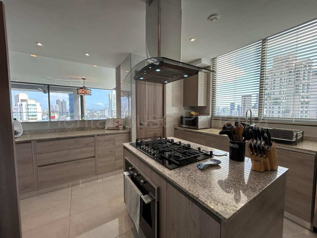 Spacious master bedroom with large window city skyline view in PH Prestige Panama City