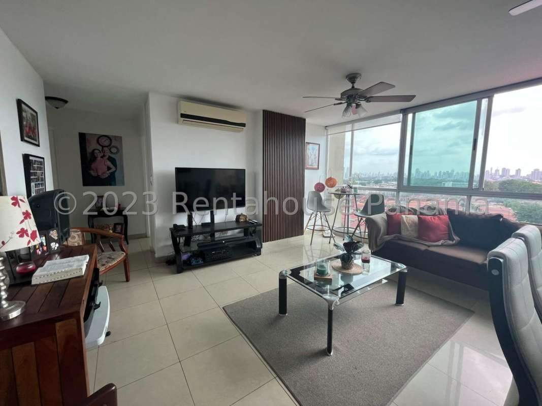 Balcony with glass railing, view of sea and city skyline at PH Creta Chanis