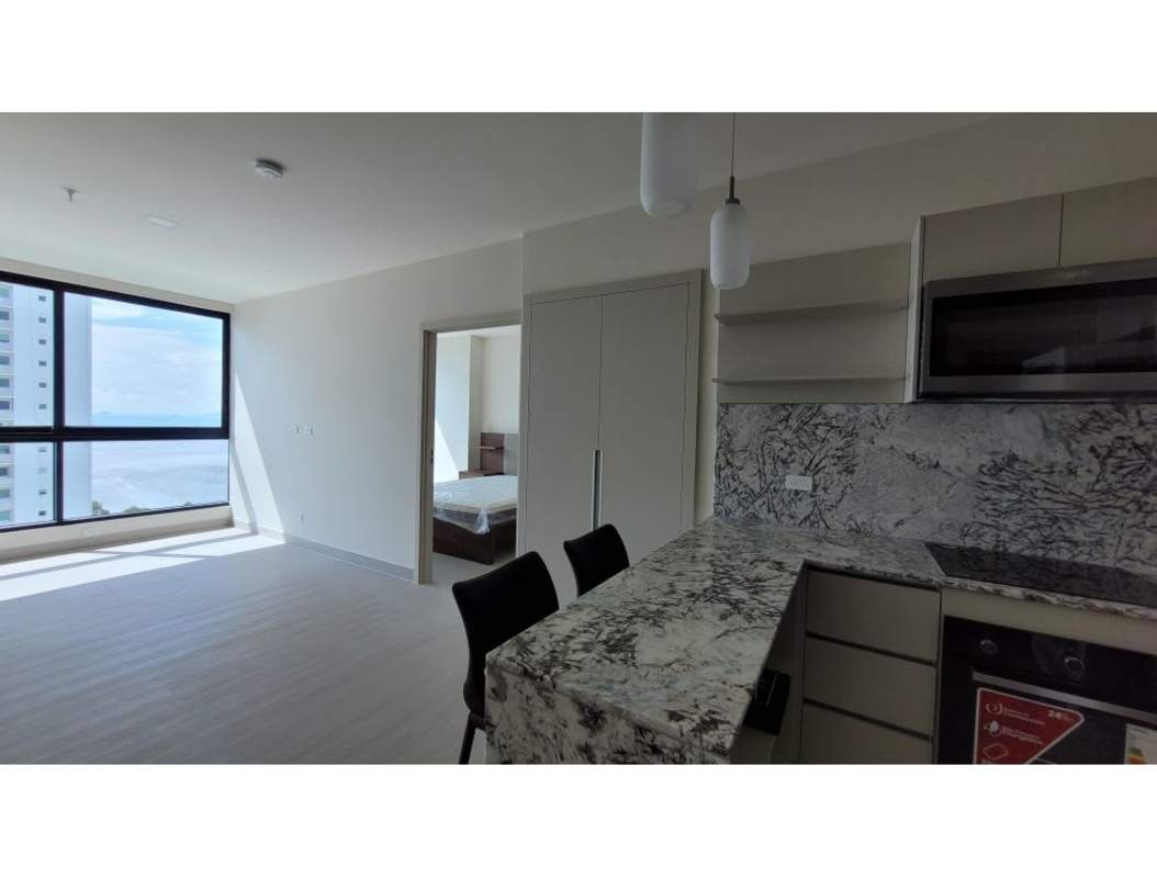 Modern apartment living area with balcony city ocean views in PH Matisse Panama