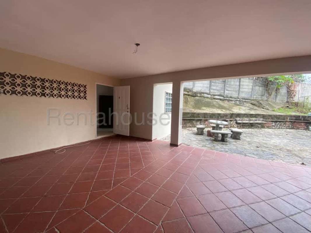 Spacious empty bedroom with ceiling fan natural light beige walls Panama family home