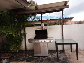 Covered patio with barbecue grill and dining area Costa Esmeralda Panama