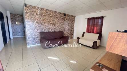 Master bedroom with closet, AC, tile floor in furnished Los Algarrobos home for rent