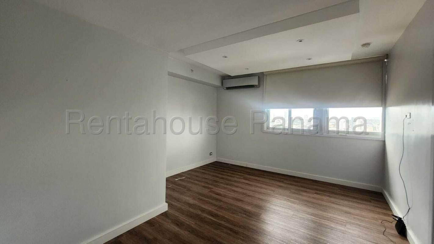 Modern dining space opening to balcony with city view in PH Coco del Mar Tower Panama