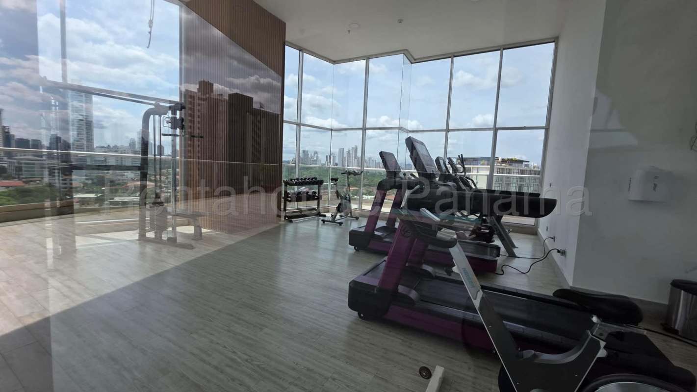 Infinity rooftop pool with ocean and skyline views at PH Coco del Mar Tower