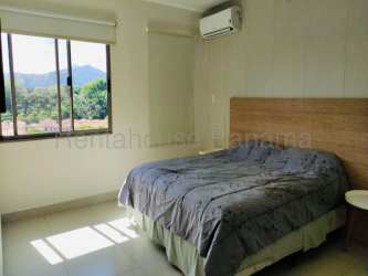 Modern bathroom with pedestal sink, glass shower in PH Woodlands Panama Pacifico condo