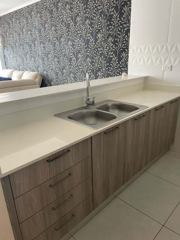 Infinity swimming pool and jacuzzi on rooftop with city skyline PH Vivendi Green Edison Park Panama