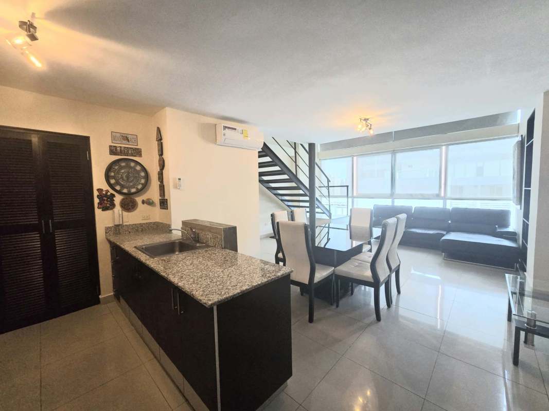 Spacious loft open-plan living and dining with mezzanine in PH Vitro Loft El Cangrejo Panama