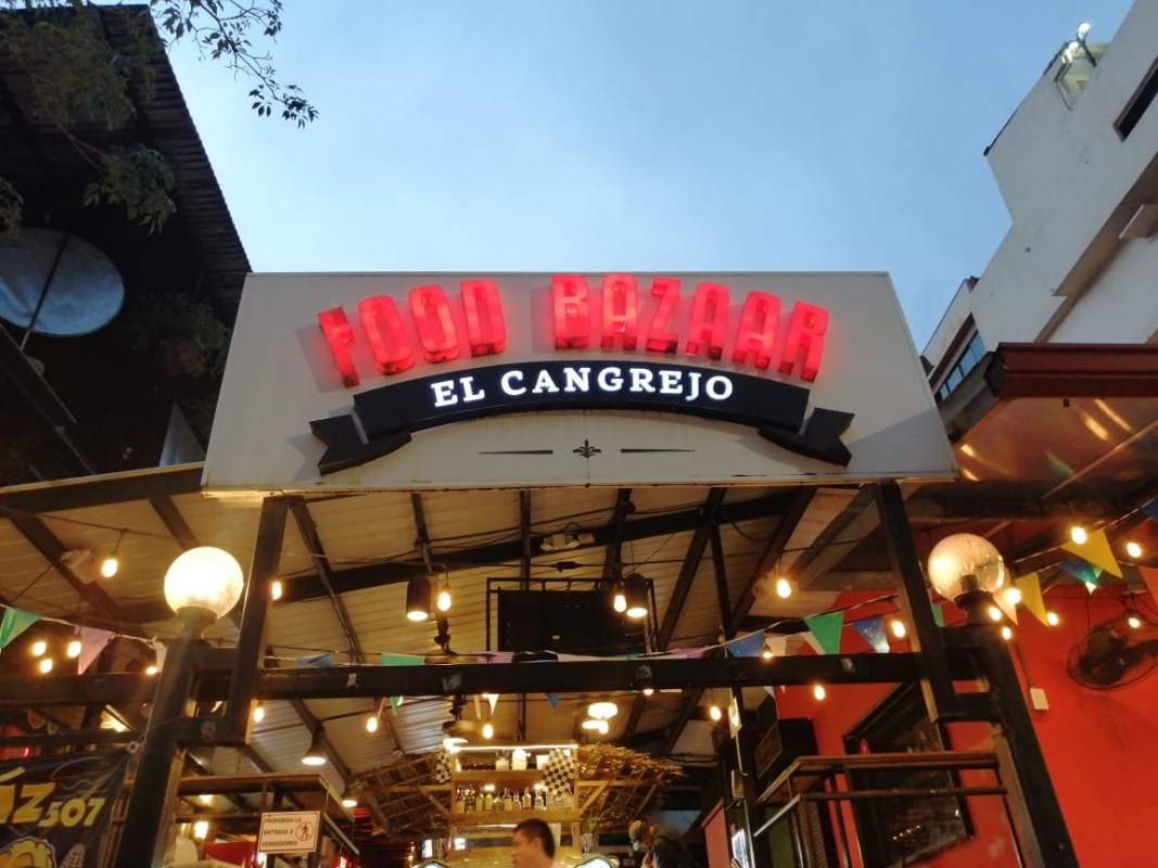 Exterior entrance with string lights and signage Food Bazaar Plaza El Cangrejo Panama