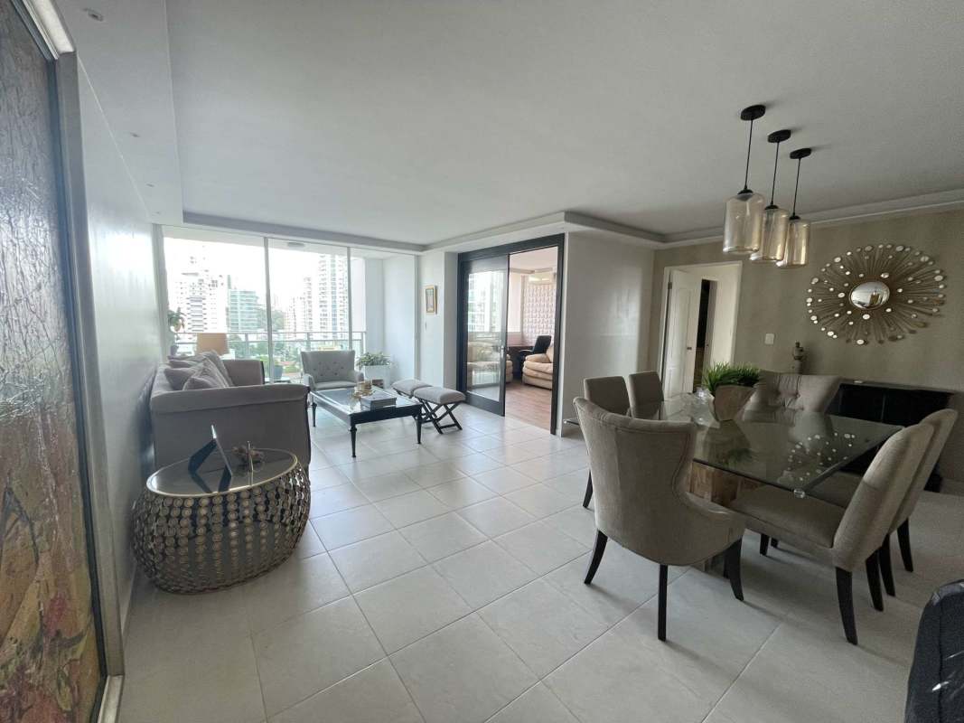 Contemporary dining room glass table beige chairs feature wall AC PH San Francisco Bay Panama