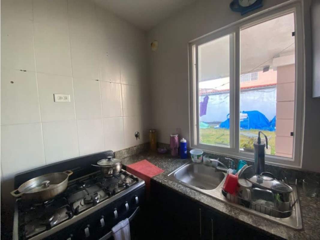 Modern kitchen with granite countertops double sink window PH Villa Navona Panama