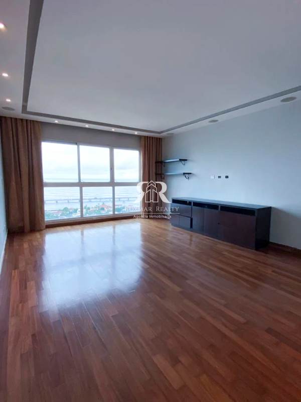 Family/den area with floor-to-ceiling windows, ocean views at PH Puntarenas Coco del Mar