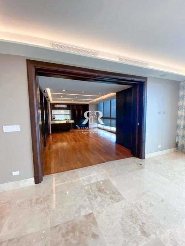 Large open plan dining room with marble floors, panoramic windows at PH Puntarenas Panama