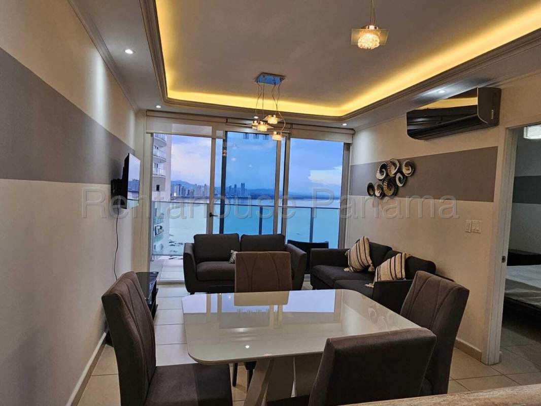 Infinity swimming pool and skyscraper facade Oasis on the Bay Punta Pacifica Panama