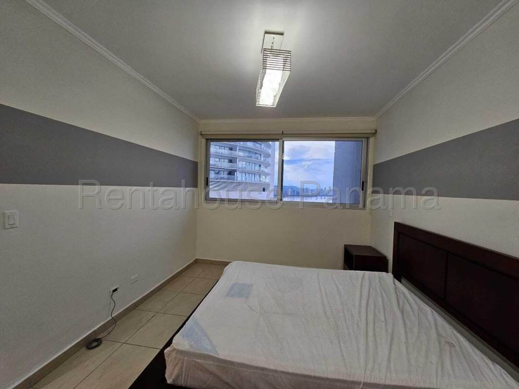 Second bedroom with window and closet at Oasis on the Bay Panama City