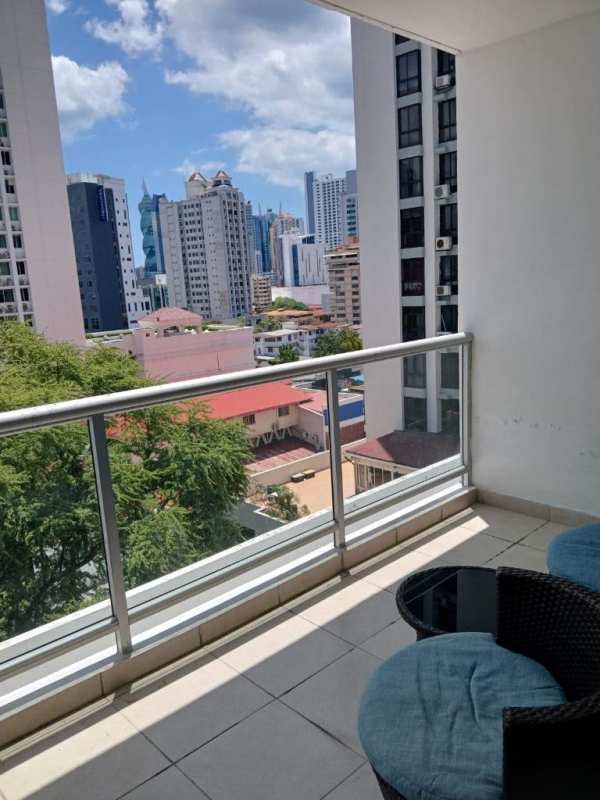 Balcony with outdoor seating and city skyline view at PH El Cangrejo Plaza Panama