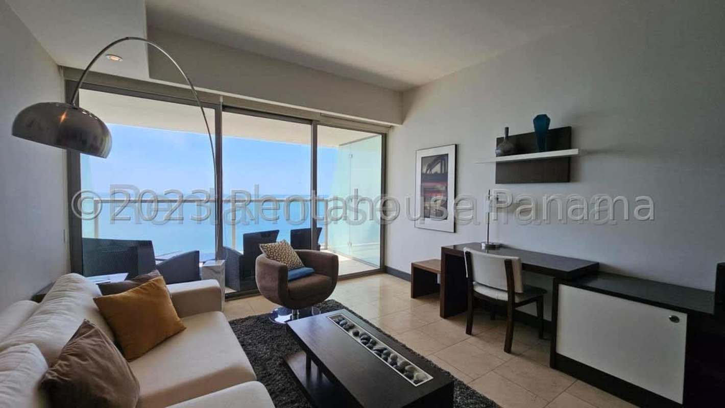 Open plan furnished studio with balcony and ocean views at Punta Pacifica Trump Ocean Club apartment