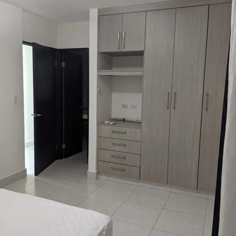 Bedroom with built-in closet, split AC, window light in Edison Park apartment Panama