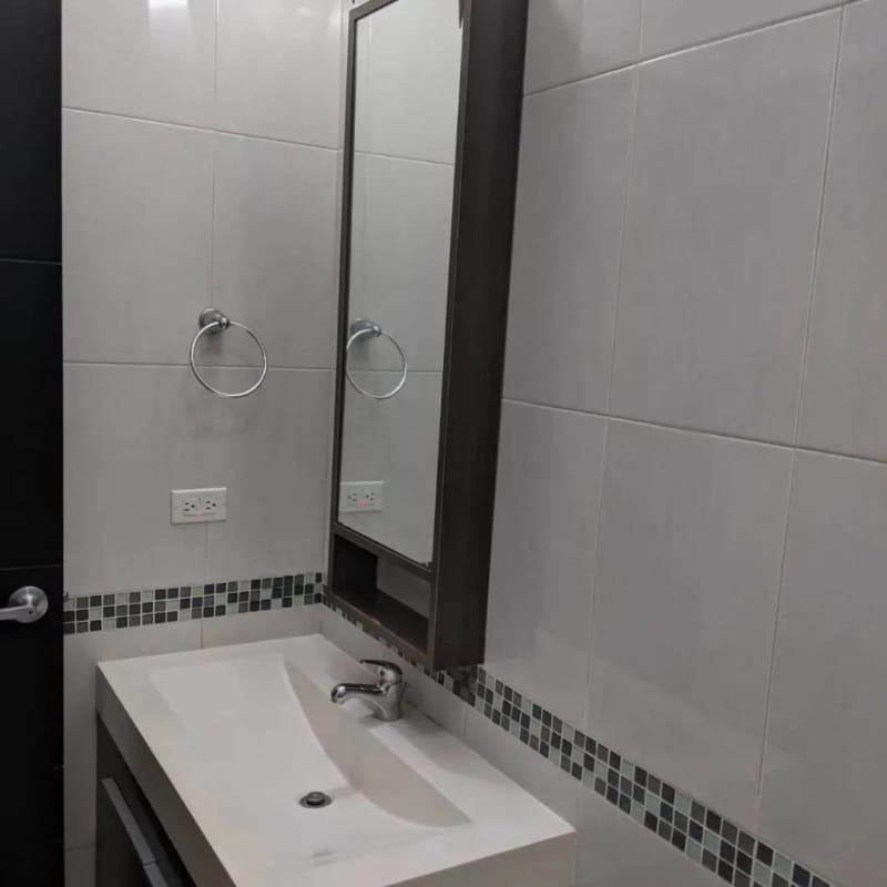 Bedroom with AC and window light furnished apartment Edison Park Panama City