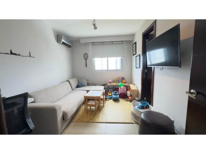 Modern kitchen with granite countertops and island in PH Titanium Costa del Este Panama