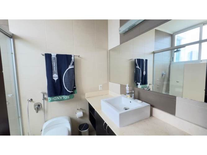 Modern bathroom with glass shower and granite double vanity in PH Titanium Panama