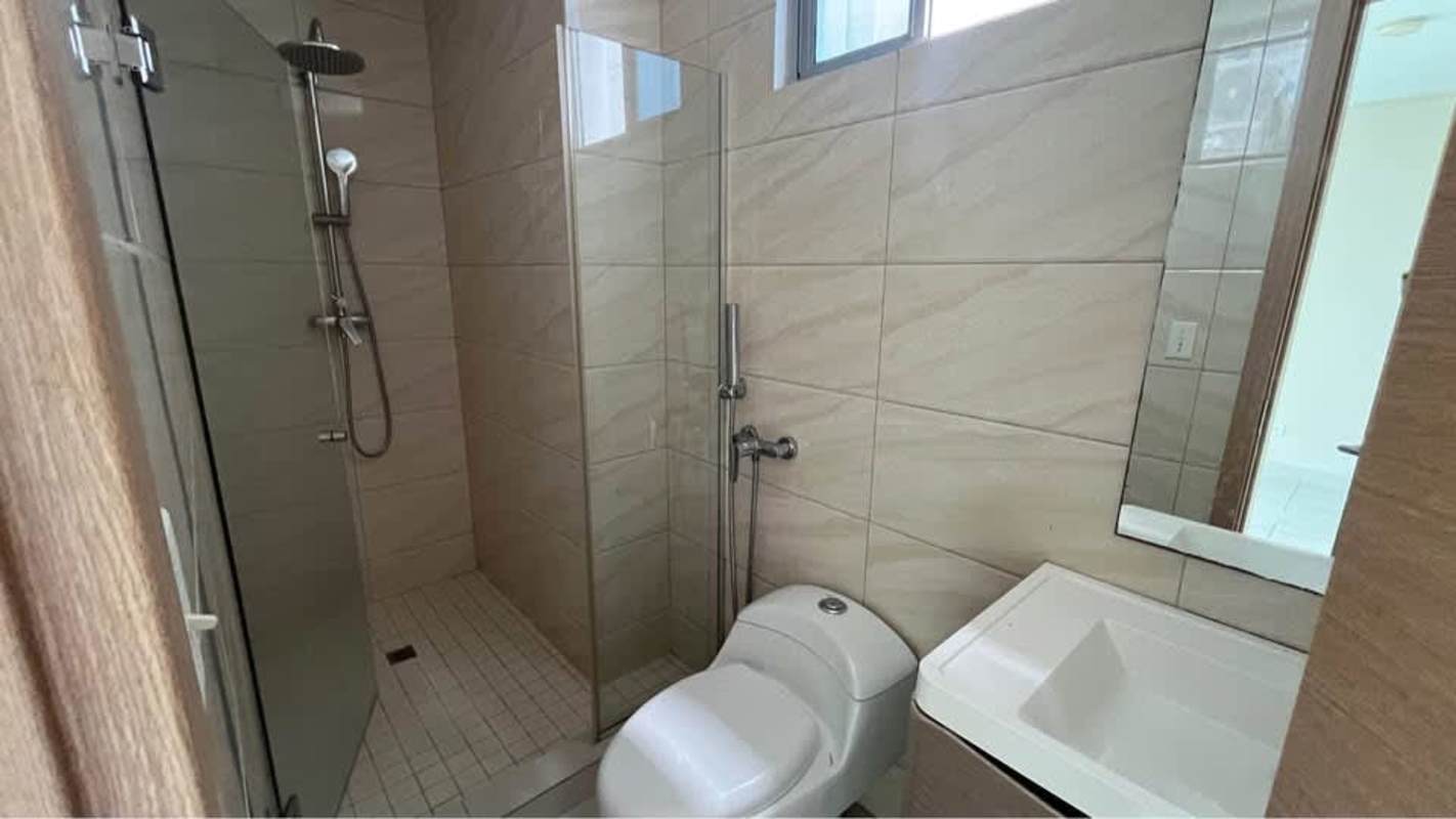 Minimalist kitchen with granite top island and storage in PH Torres de Castilla Panama