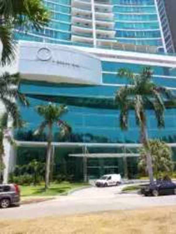 High-rise glass facade condo tower PH Ocean One located oceanfront Costa del Este