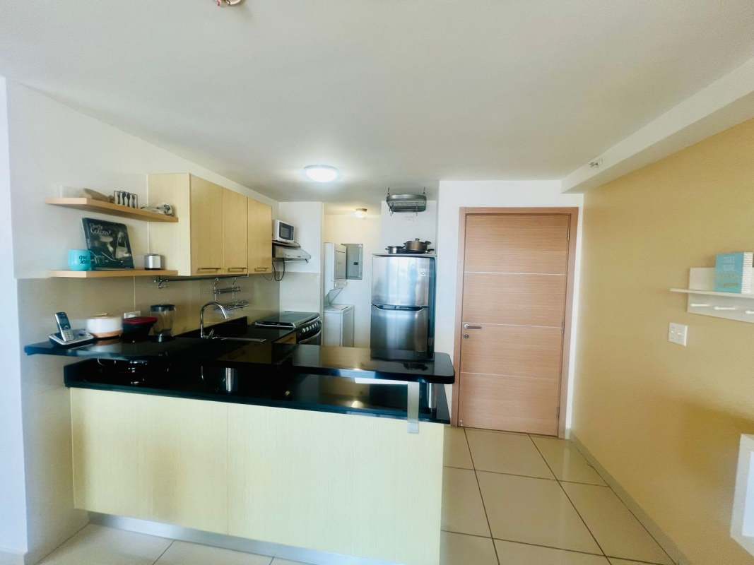 Comfortable bedroom with window view, built-in closet, ceiling fan in Carrasquilla Panama