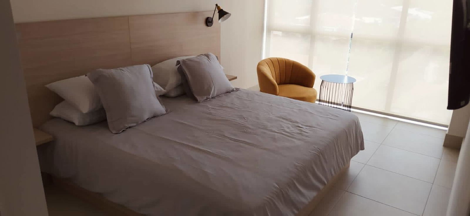 Laundry area with washer dryer combo inside furnished apartment PH Coco Place Panama