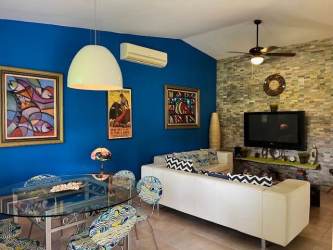 Bedroom with bunk beds, ceiling fan, natural light beach house Las Lajas Panama