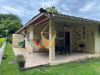 Outdoor dining patio seating area with BBQ grill Panama Las Lajas beach house