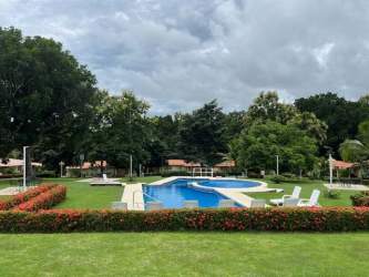Bedroom with AC large window and modern decor Las Lajas Panama beach house rental