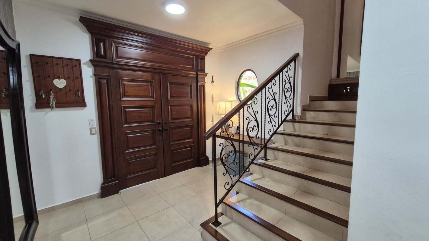 Luxury kitchen with center island, granite countertop and stainless appliances El Doral Costa Sur Panama