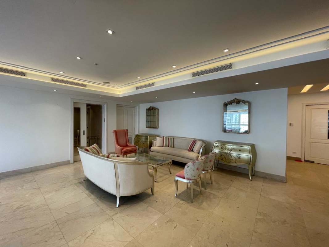 Elegant dining area with large windows cityscape views marble floors in PH Paitilla Tower Panama