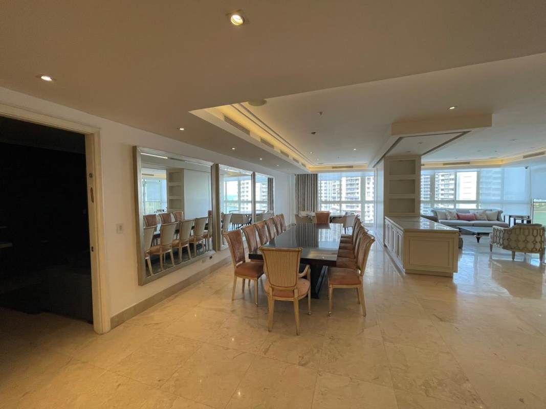 Comfortable family room with marble floors large windows city and ocean views in Punta Paitilla apartment