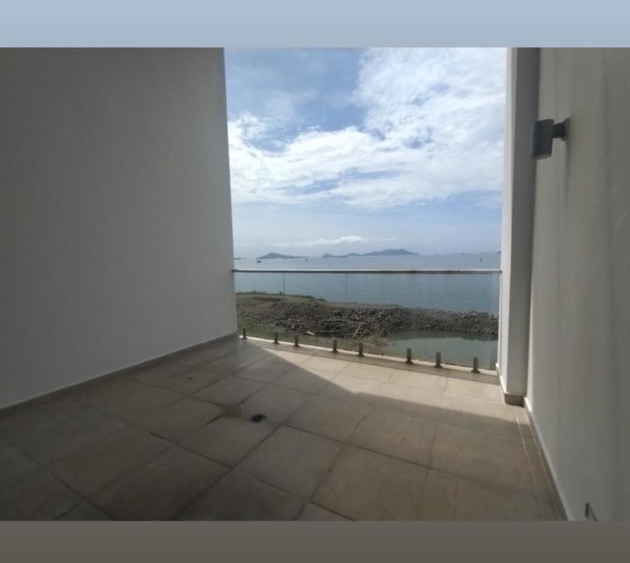 Floating wooden staircase in bright modern interior apartment at Naos Harbour Amador Panama