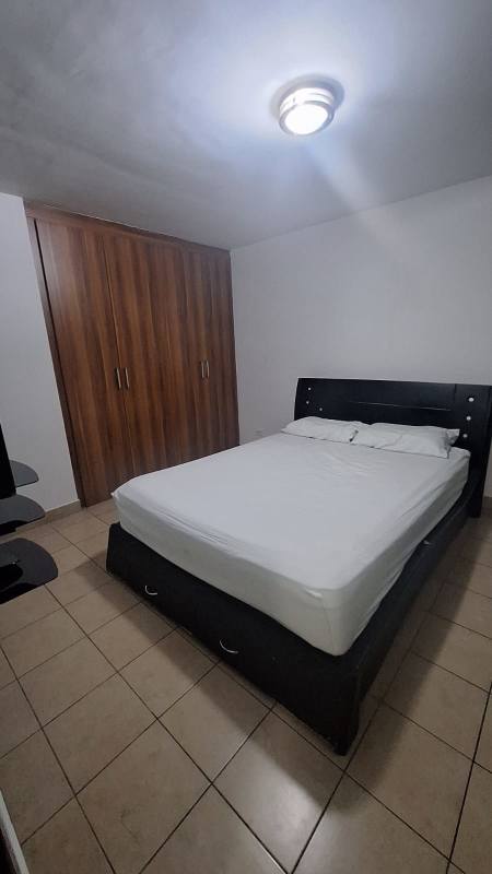 Modern living room with glass sliding door to balcony in PH Parque Lefevre Sky Panama City