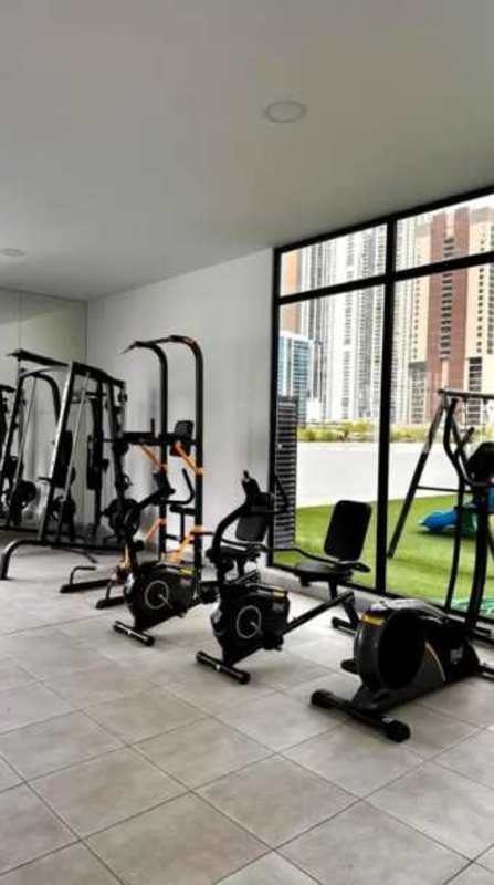 Modern residential gym with city skyline views at PH The Gray Calle 50 Panama