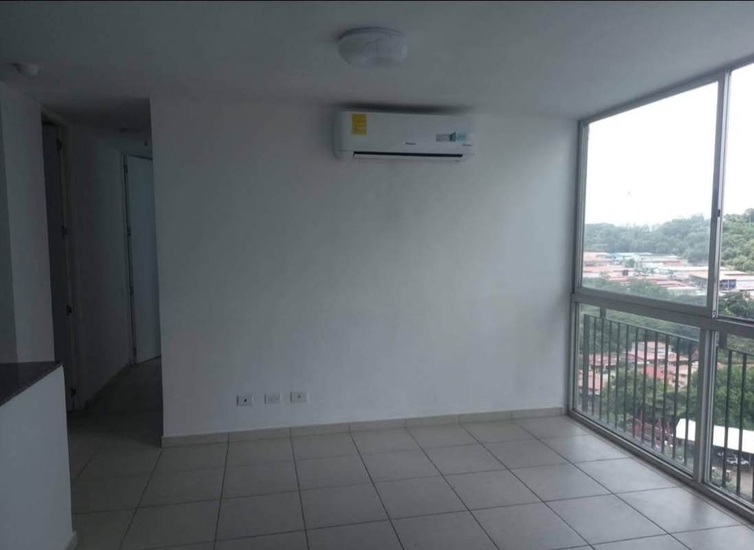 Empty living space with AC, large window city view apartment PH Alsacia Tower Condado del Rey