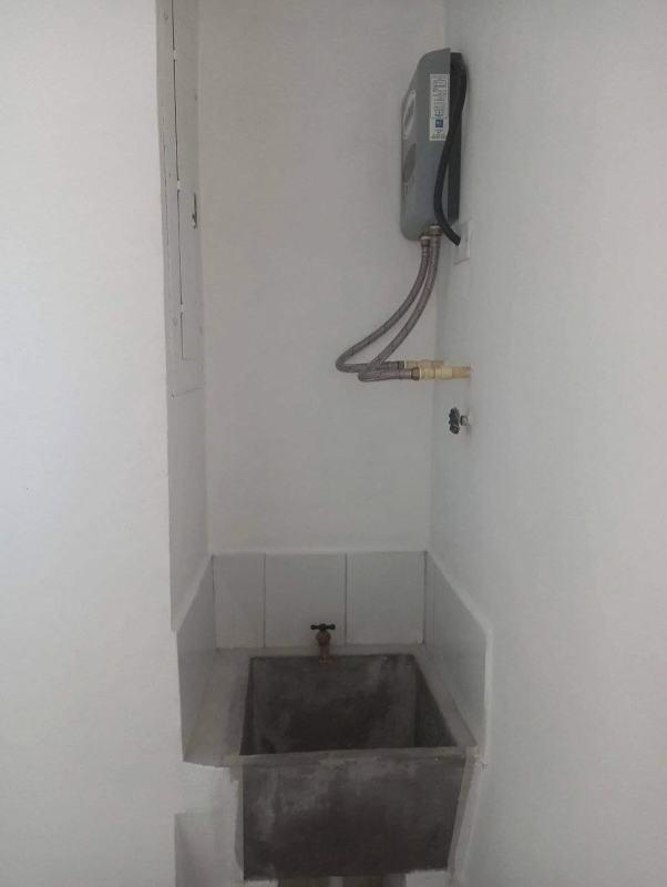 Laundry corner with gas water heater, concrete sink PH Alsacia Tower Tumba Muerto Panama