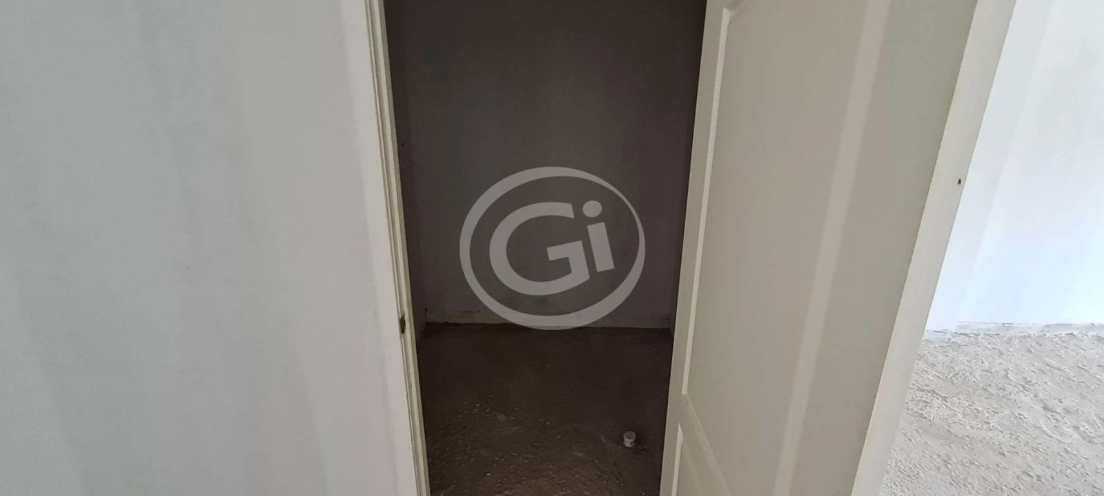 Glass facade of commercial retail unit for rent in busy Costa Sur Mall Panama City