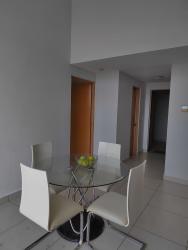 Kitchen with granite countertops breakfast bar and appliances in PH River Valley Panama