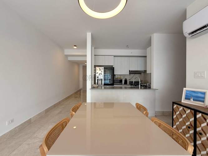 Modern marble bathroom with glass shower luxury apartment Waters on the Bay Panama