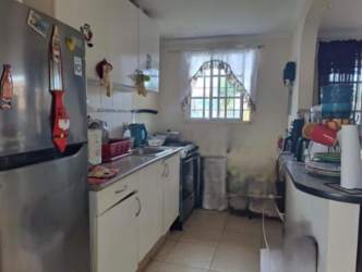 Bedroom with natural light tile flooring built-in closet La Chorrera Panama Oeste