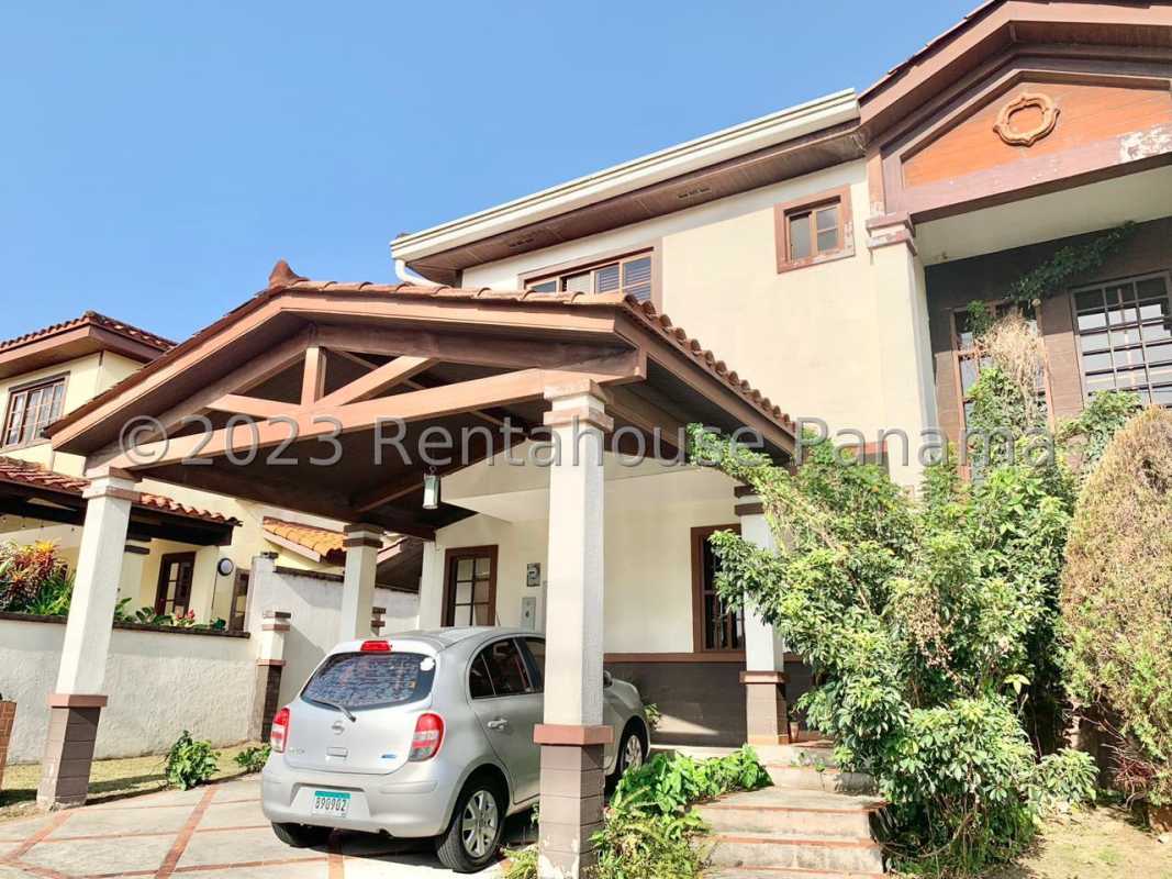 Kitchen with granite countertops, wood cabinetry, appliances, ceiling fan in Mirador del Lago Panama