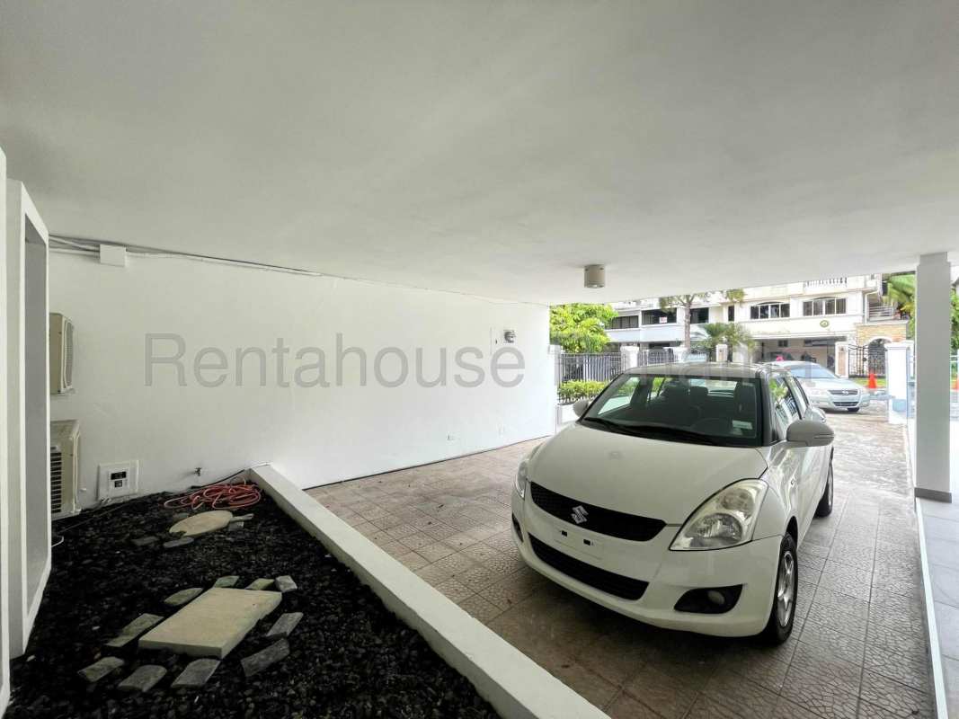 Bright living area with large windows and marble floors for rent in Obarrio Panama City