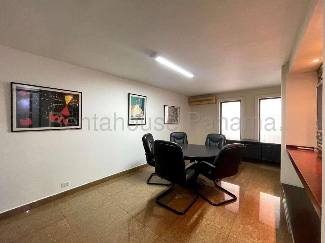 Wide hallway with light floors and neutral walls in Obarrio house for rent
