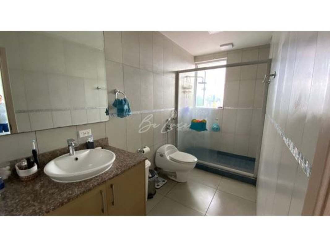 Open kitchen with granite countertop and appliances at PH Moon Tower in Coco del Mar Panama City