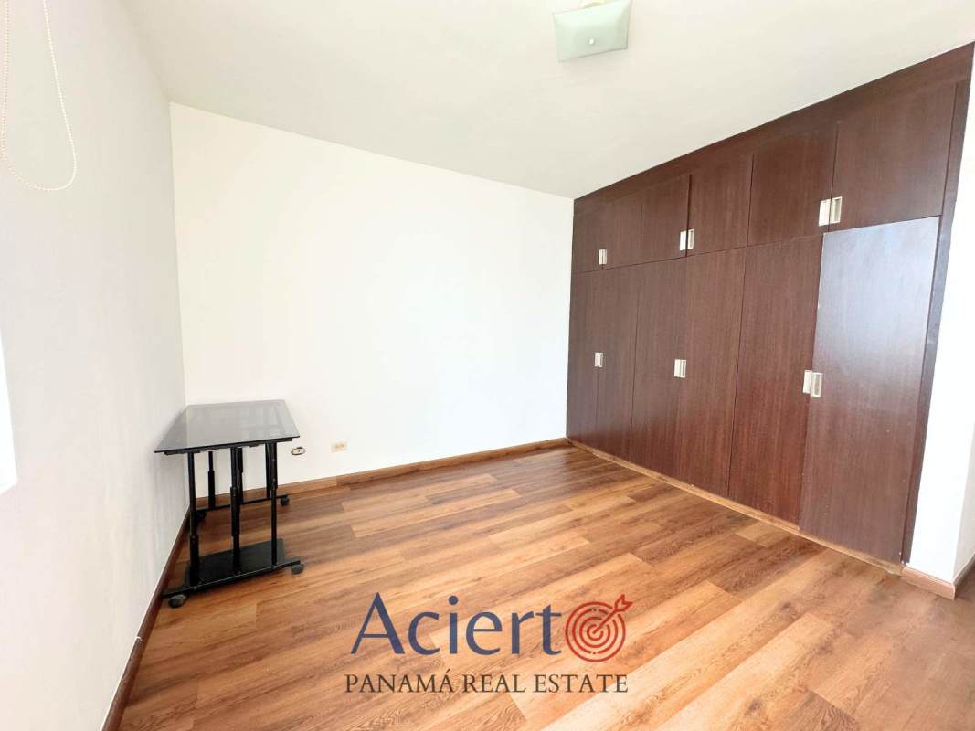 Private balcony with artificial grass flooring overlooking Panama skyline PH San Francisco